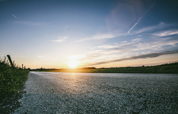 istock Mediterranean sea coast road into mountains horizon in summer with beautiful bright sun rays 2190702756