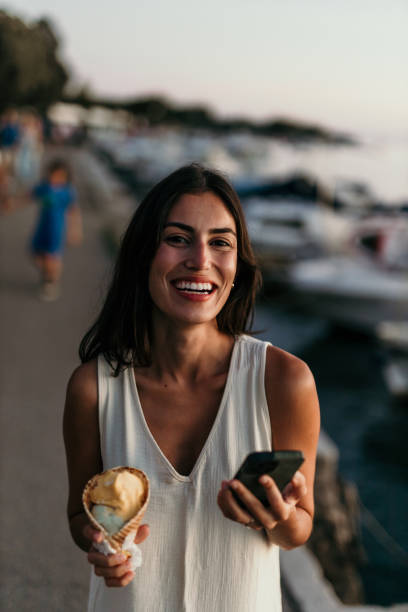 istock Woman, sea and ice cream 2190703245