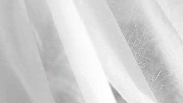 istock Minimalist white veil background with soft textures and sheer elegant design. 2190703479