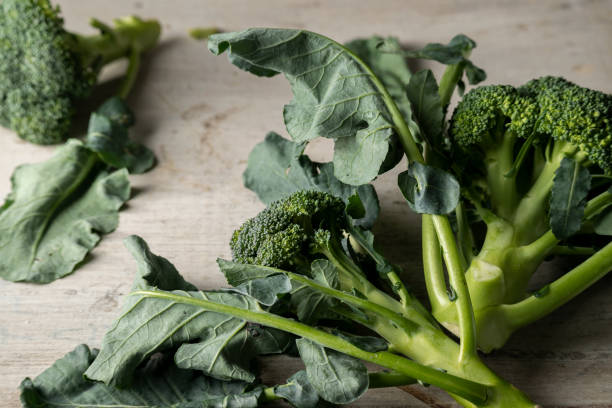 istock Fresh raw broccoli on table. Healthy vegetable ingredients 2190703660