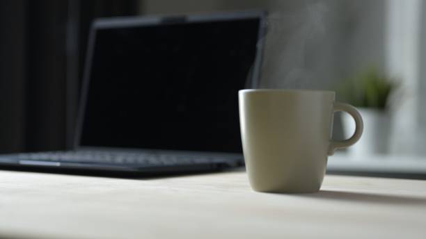 istock Morning Coffee Break at Home Office Relaxed Still Life with Steaming Mug Modern Workspace Cozy Ambiance 2190705613