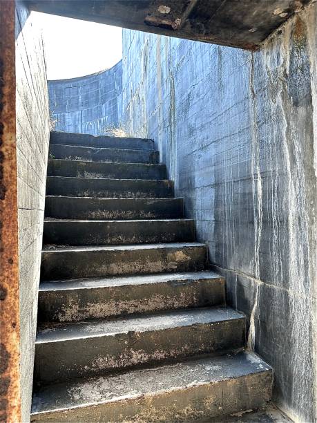 istock Worn Steps Leading to Light at Fort Pickens 2190706610