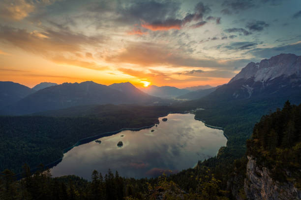 istock Sunset over Mountain Lakes with Hut 2190713120