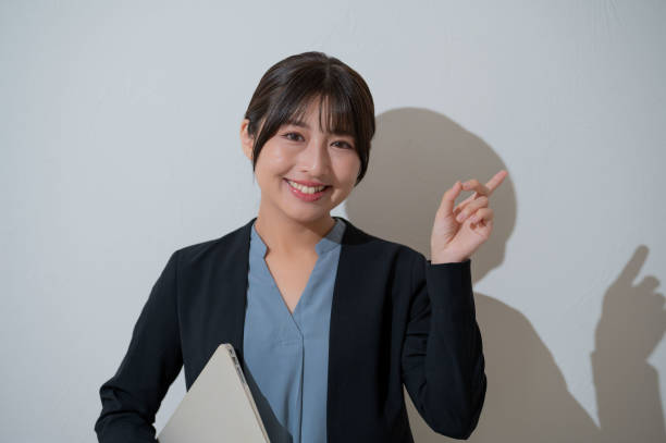 istock Japan woman guiding on white background 2190714919