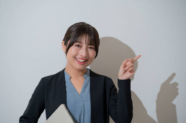 istock Japan woman guiding on white background 2190714932