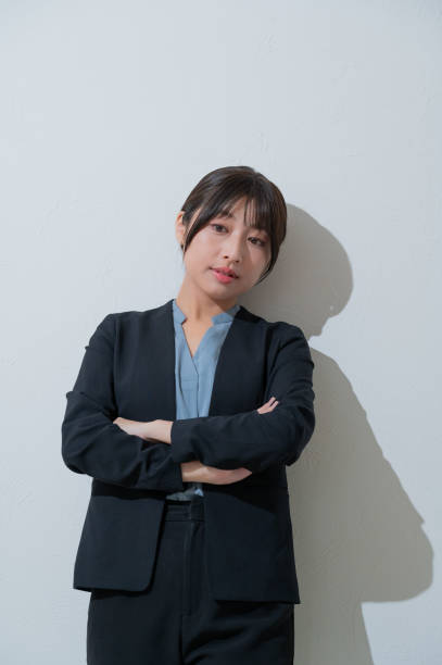 istock A Japanese woman thinking on a white background 2190715170