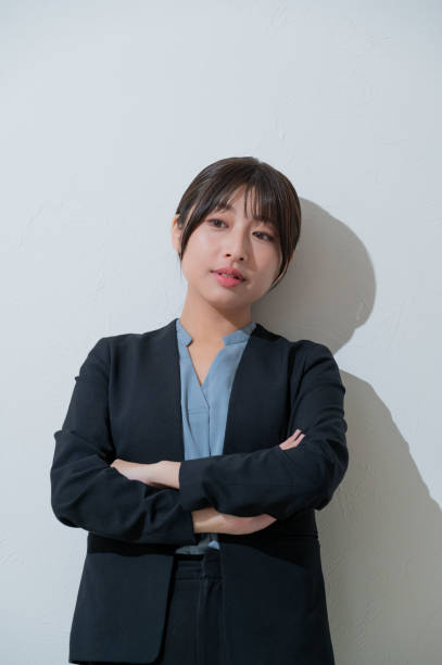 istock A Japanese woman thinking on a white background 2190715184