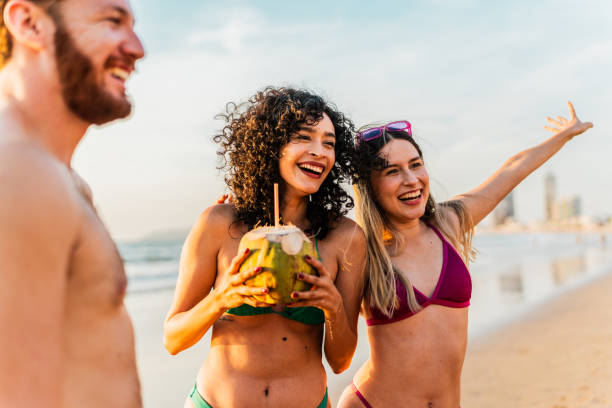 istock Young friends woman talking on the beach 2190718661