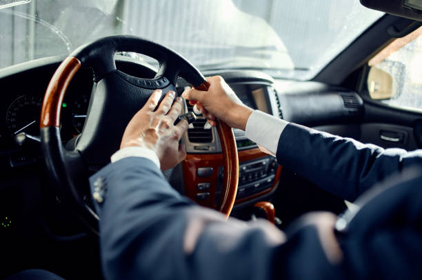 istock emotional man official passenger driver road rich 2190720620