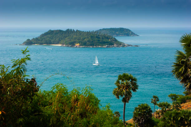 Cape is a mountain of rock that extends into the sea in Phuket, Thailand
