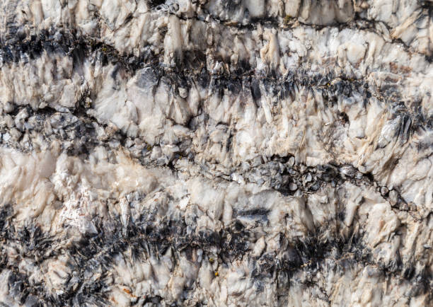 istock Natural mineral formation displaying intricate patterns found in rocky terrain during daylight 2190722148