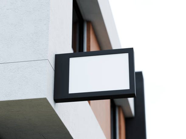 istock Blank white store signboard mockup. Lightbox on the facade. 2190723102