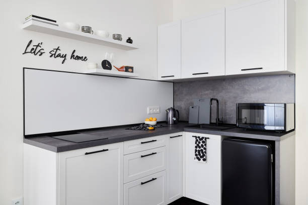 Explore the beauty of a modern minimalist kitchen design featuring stylish and chic accents