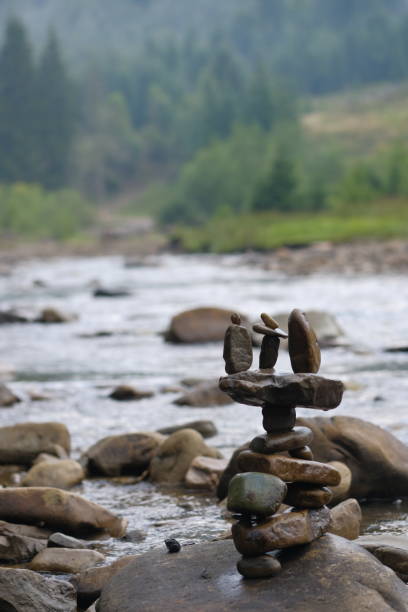istock Unusual figurine made of river pebbles. 2190726144