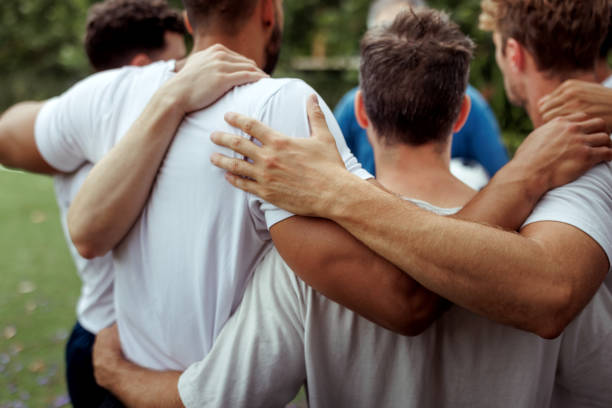 istock Soccer players having huddle 2190730225