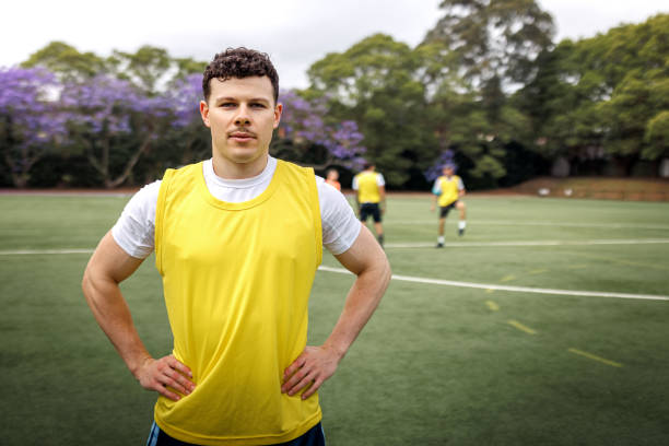 istock Soccer player posing for camera on soccer field 2190730305