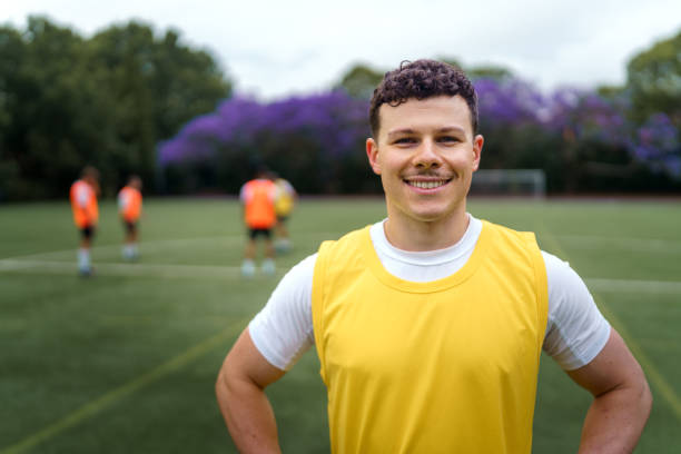 istock Soccer player posing for camera on soccer field 2190730523
