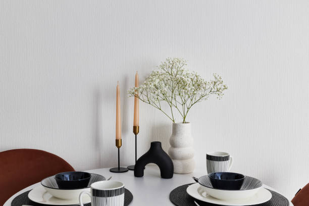 istock Elegant Table Setting with Minimalist Decor and Fresh Flowers for a Perfect Dining Experience 2190731707