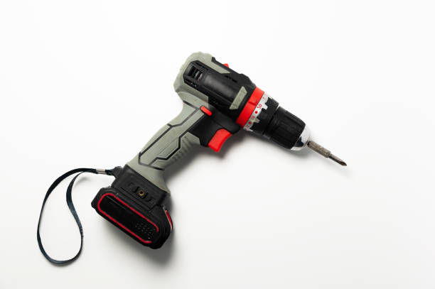 istock Drilling equipment, electric tool drill, cordless screwdriver. Working industrial power tool, screwdriver on white background 2190733072