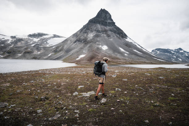istock Trekker Admiring Majestic Mountain in Norway 2190734293