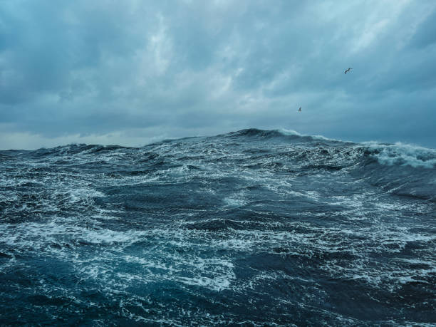 On a fishing boat trawler sailing rough sea Fishing boat sailing out at rough sea shot with mobile phone onboard north sea waves stock pictures, royalty-free photos & images