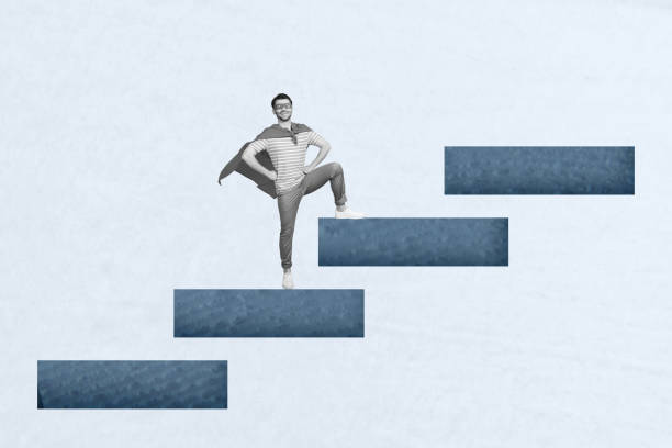 istock Creative collage picture illustration black white filter excited successful young man stand hero super stair cloak unusual white background 2190734679