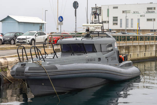 Rijeka, Croatia - October 24, 2024: Official Croatian Customs Patrol Vessel Fast Riggid Boat Moored at Port of Rijeka Ready for Duty Rainy Day.