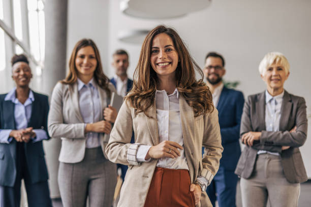 istock Confident businesswoman and her team 2190746942