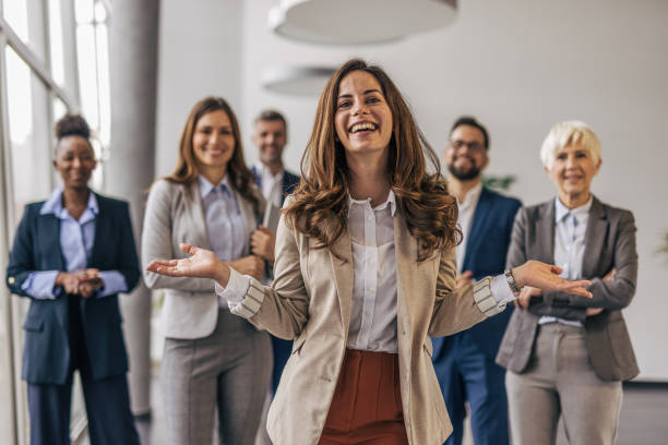 istock Confident businesswoman and her team 2190747108