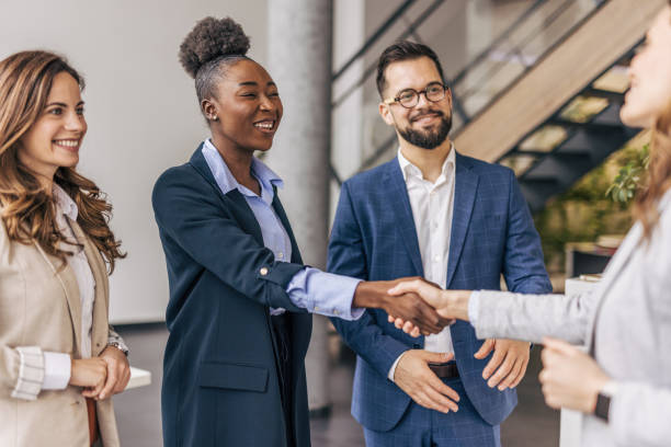 istock Business people shaking hands in the office 2190747422