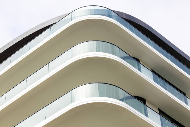 Closeup brand new modern apartment building, white background with copy space, full frame horizontal composition, Sydney Australia