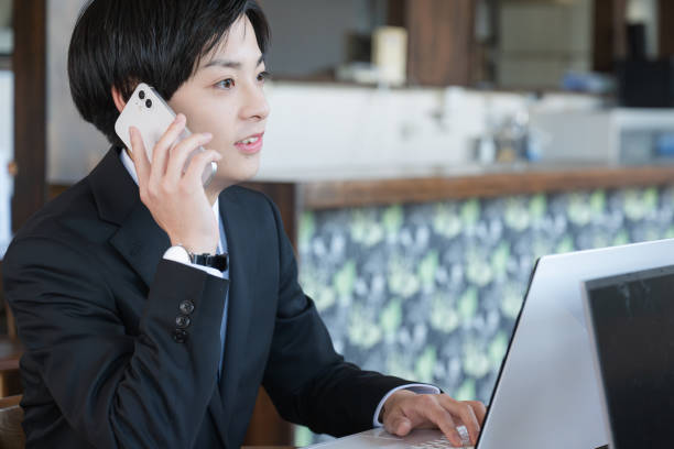 istock Business man and phone 2190749115