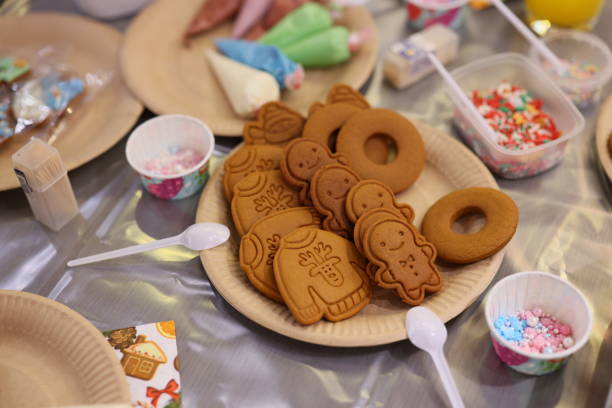 istock Delightful Festive Gingerbread Cookies topped with Colorful Decorations and Icing Galore 2190751085