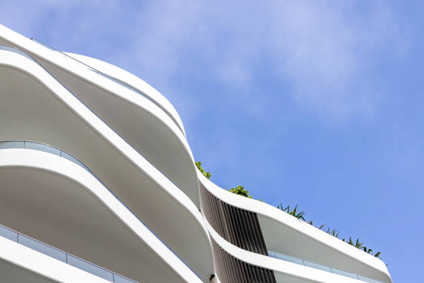 istock Closeup top part of modern apartment building, background with copy space 2190753024