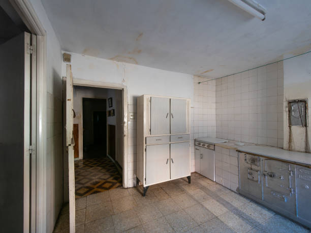 istock Old damaged kitchen showing neglect and decay in uninhabited house 2190753318