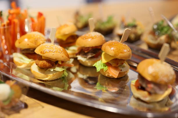 istock Gourmet Sliders served beautifully on a shining Silver Platter, perfect for any gathering 2190753765