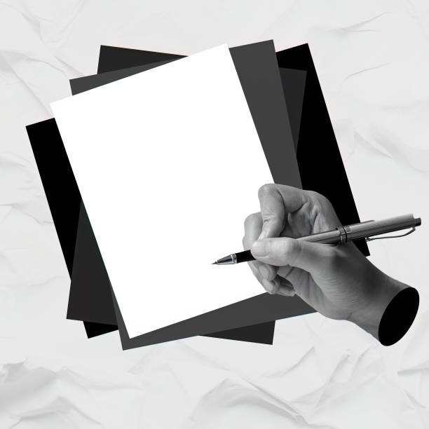 istock Creative hand preparing to write on blank paper for artistic expression, minimalist style 2190757942