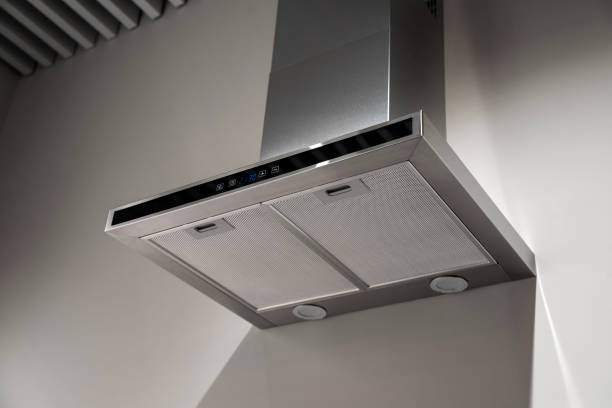 istock Stainless steel kitchen range hood mounted on a wall 2190759076