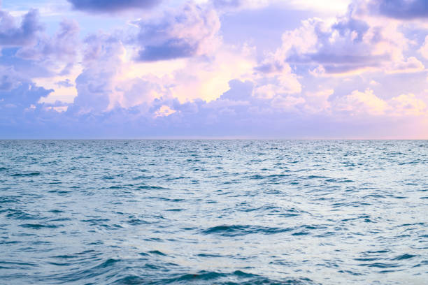 Ocean dramatic sky background. Dark stormy cloudy sky. Seascape with dramatic sky. Cloudy sky over sea