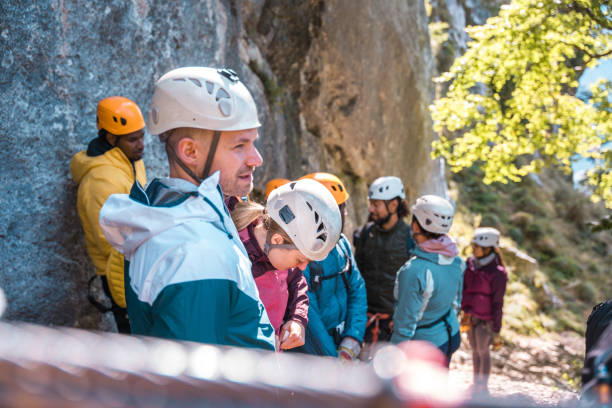 istock Diverse Group Preparing for Zipline Adventure Outdoors 2190760454