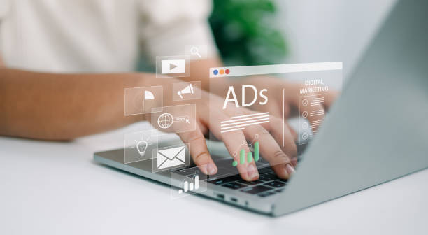 istock Woman using laptop and tablet with Ads dashboard digital marketing strategy analysis for branding, Online advertisement, Digital marketing concept, BAd on website and social media, SEO. 2190766794