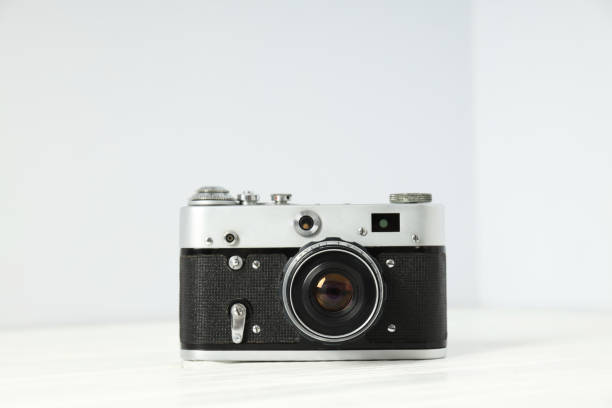 istock Vintage photo camera on white background, closeup 2190767021