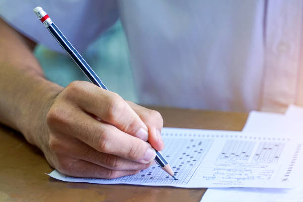 istock Asian students are taking exams to measure learning in the classroom. Soft and selective focus. 2190768302