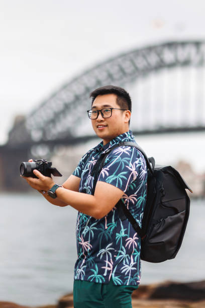 istock Tourist taking photos at Sydney Harbour, Australia 2190769106