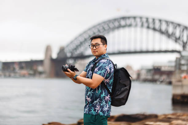 istock Tourist taking photos at Sydney Harbour, Australia 2190769108