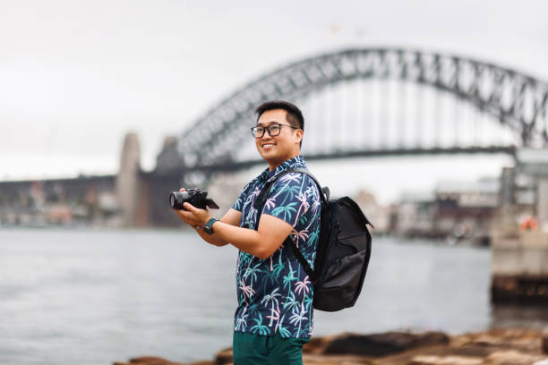 istock Tourist taking photos at Sydney Harbour, Australia 2190769110