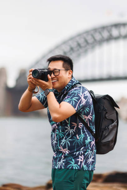 istock Tourist taking photos at Sydney Harbour, Australia 2190769112