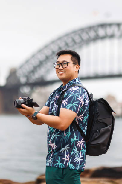 istock Tourist taking photos at Sydney Harbour, Australia 2190769113