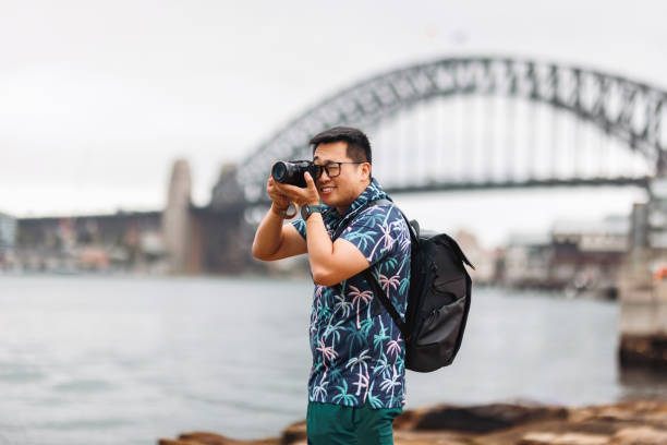 istock Tourist taking photos at Sydney Harbour, Australia 2190769116