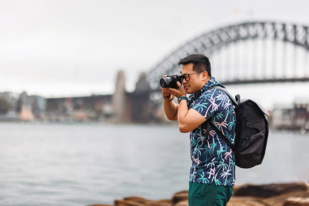 istock Tourist taking photos at Sydney Harbour, Australia 2190769117
